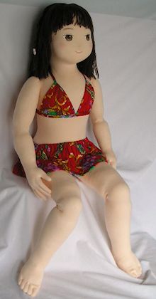 Girl doll in swimwear